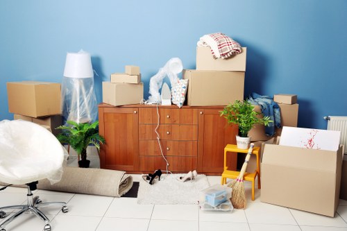 Piano movers positioning an instrument carefully inside a Pimlico home or venue
