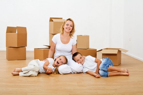Professional moving staff organizing boxes in Pimlico