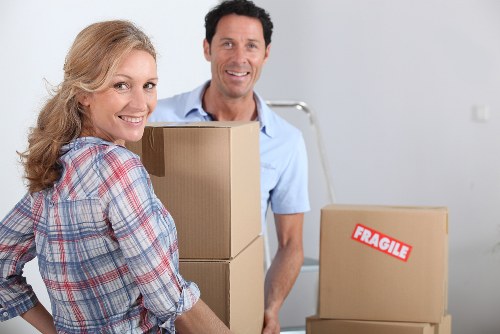 Careful lifting of household items during a Pimlico removals job