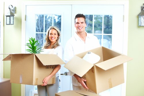 Careful loading of office items during a commercial move in Pimlico